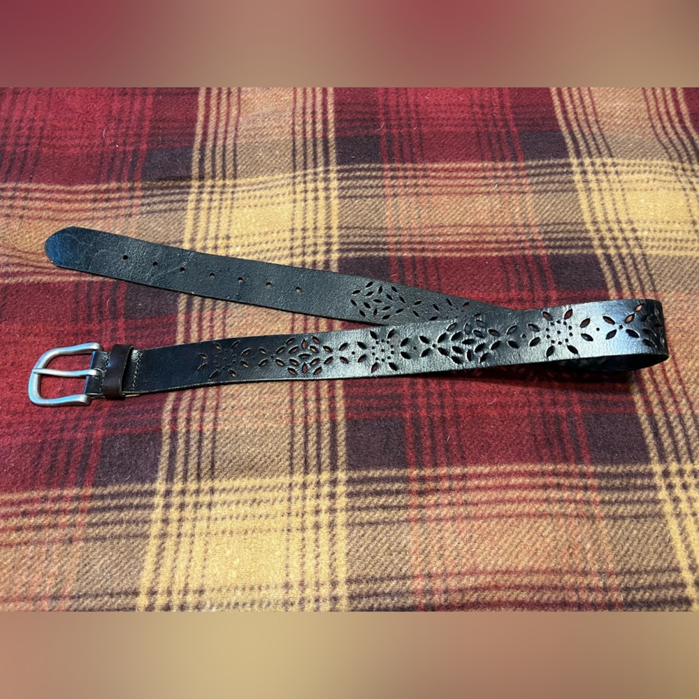 Patterned belt. 38 inches long.  Dark brown.